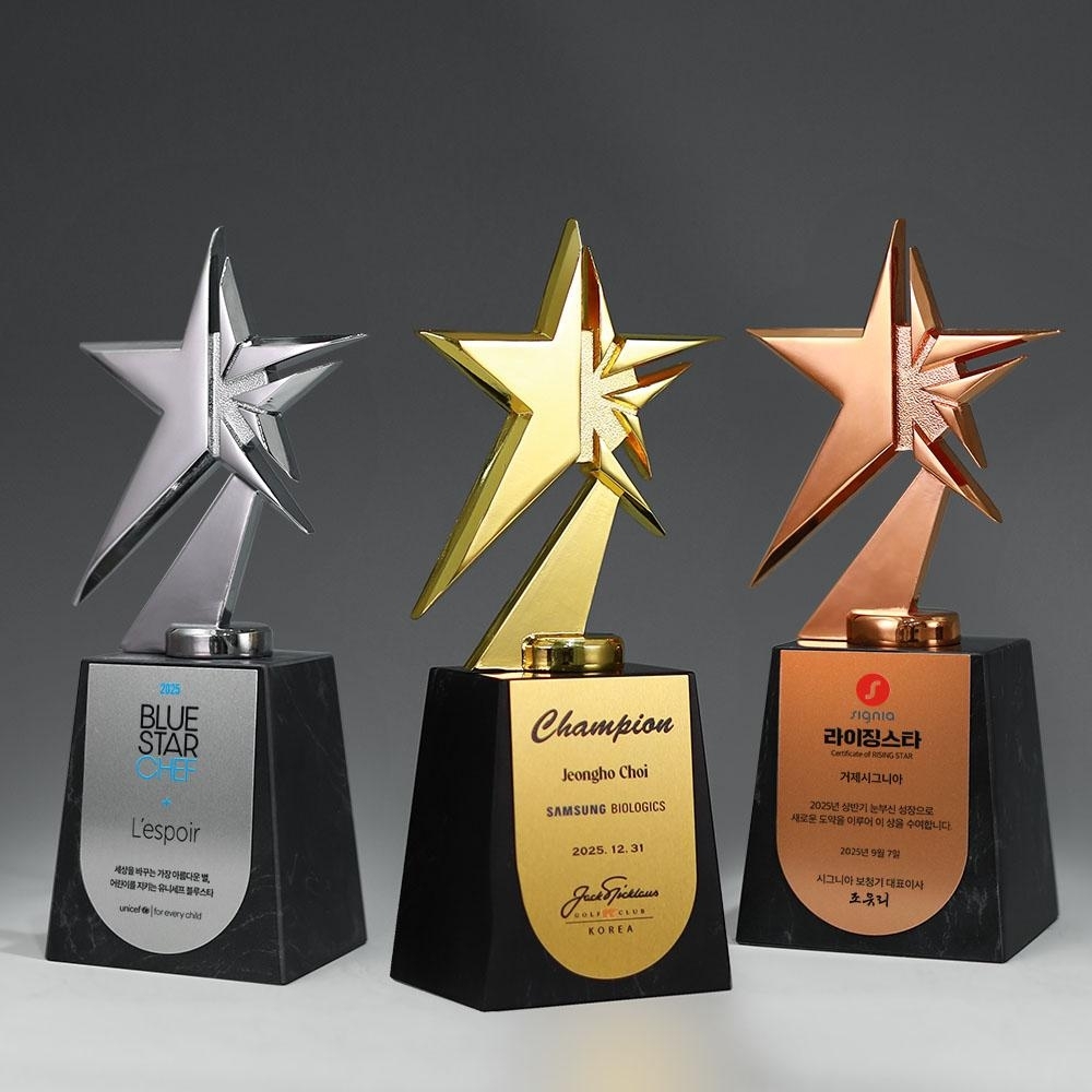 유니크한 별 조형의 상단부와 고급스러운 블랙 천연대리석 베이스가 조합된 디자인으로, 시상식 트로피 및 스포츠 트로피 제작에 적합한 금색, 은색, 동색 트로피시리즈 입니다.