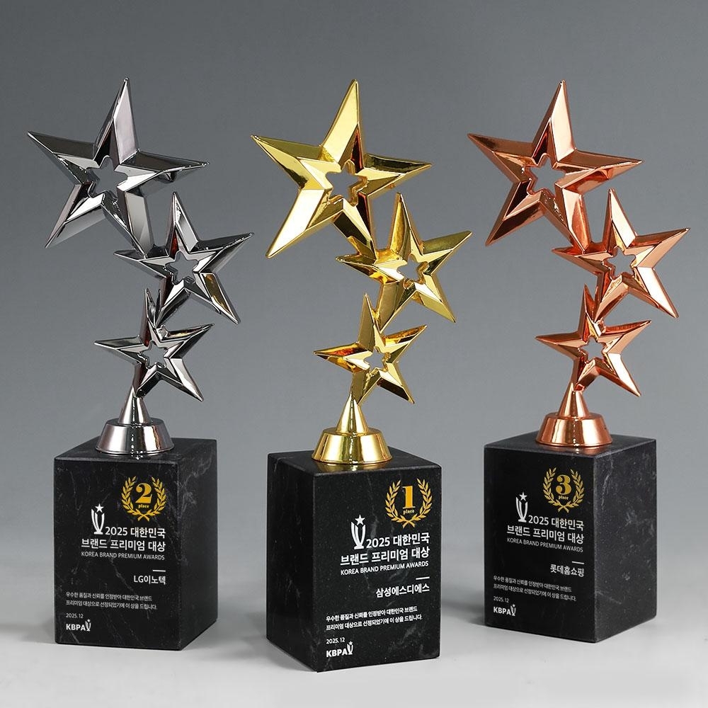 유니크한 별 조형의 상단부와 고급스러운 블랙 천연대리석 베이스가 조합된 디자인으로, 시상식 트로피 및 스포츠 트로피 제작에 적합한 금색, 은색, 동색 트로피시리즈 입니다.